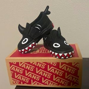 Vans off the wall shark edition shoes. New in box. Never worn. Size 4T